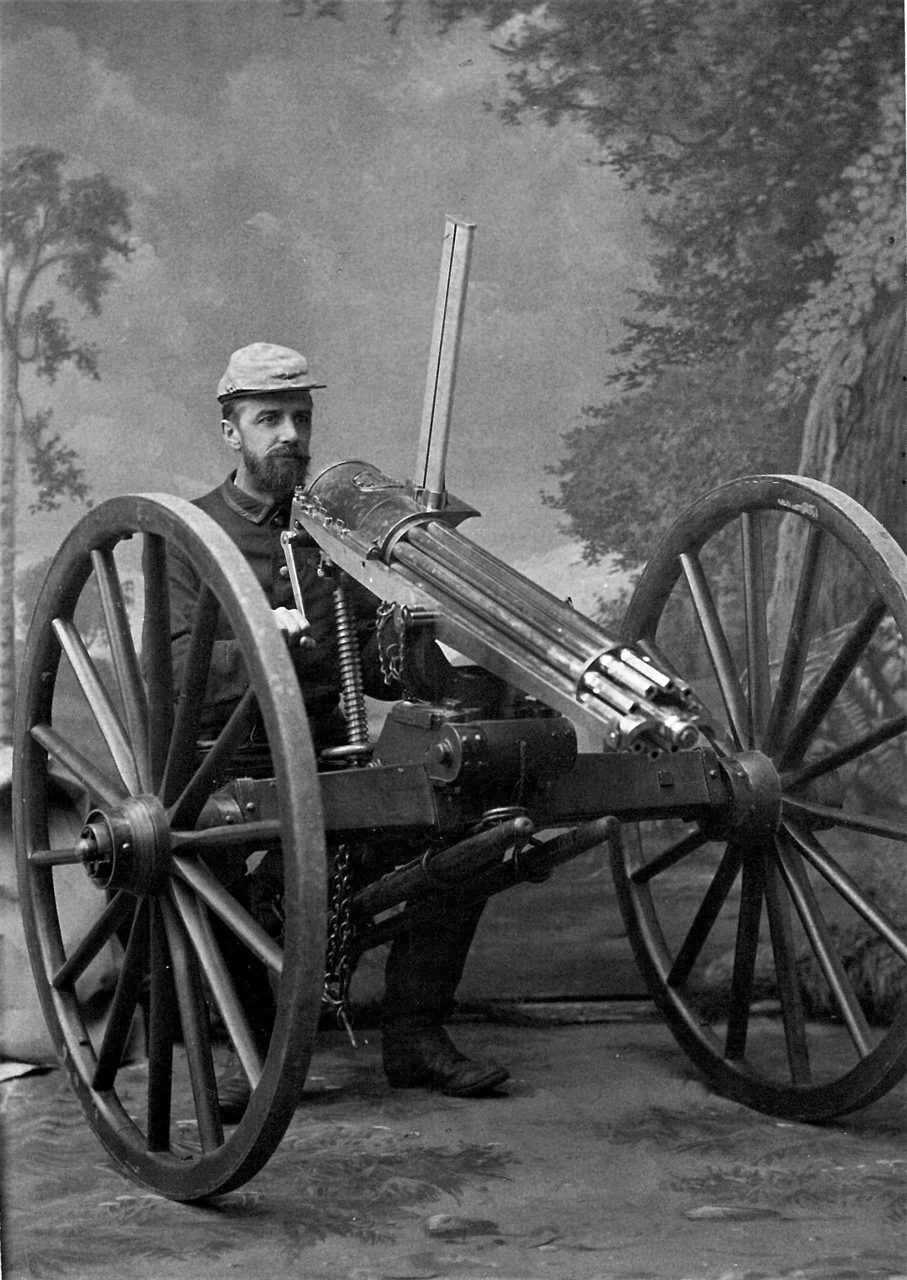 Captain-Gat-Howard-with-a-Gatling-Machine-Gun-used-during-Batoche-1885-scaled